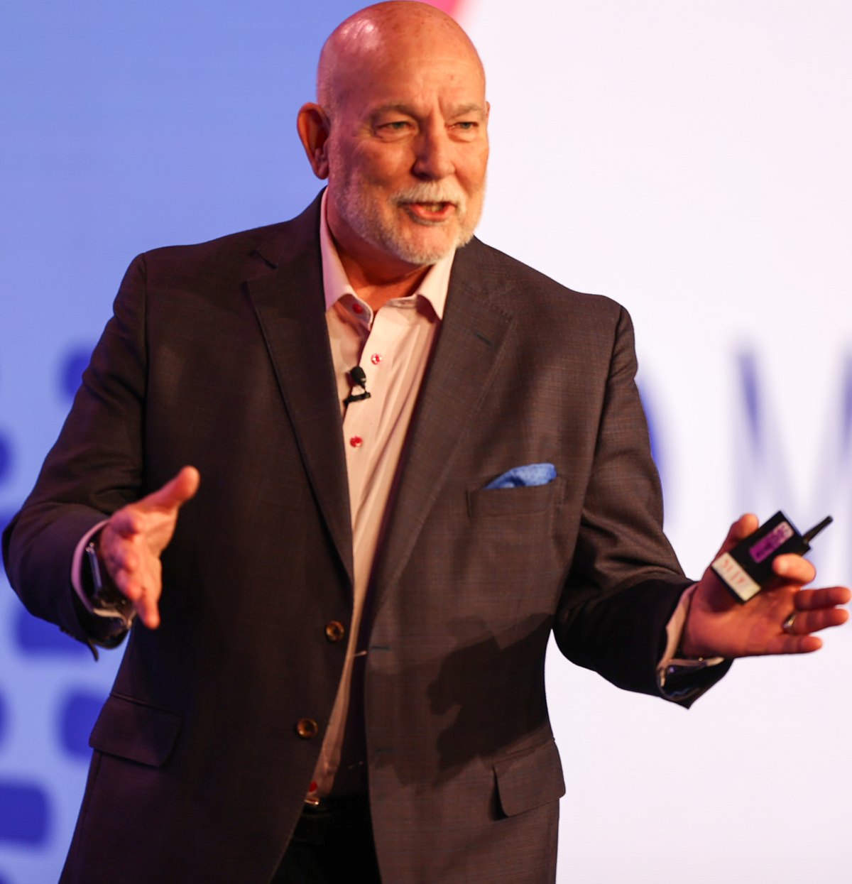 Don speaking on stage at Bogue Elevate